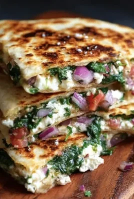 Mediterranean Quesadillas with Spinach, Feta, Mozzarella, and Red Onion