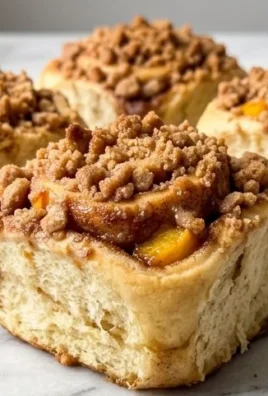 Peach Cobbler Cinnamon Rolls with Crum extractb Topping